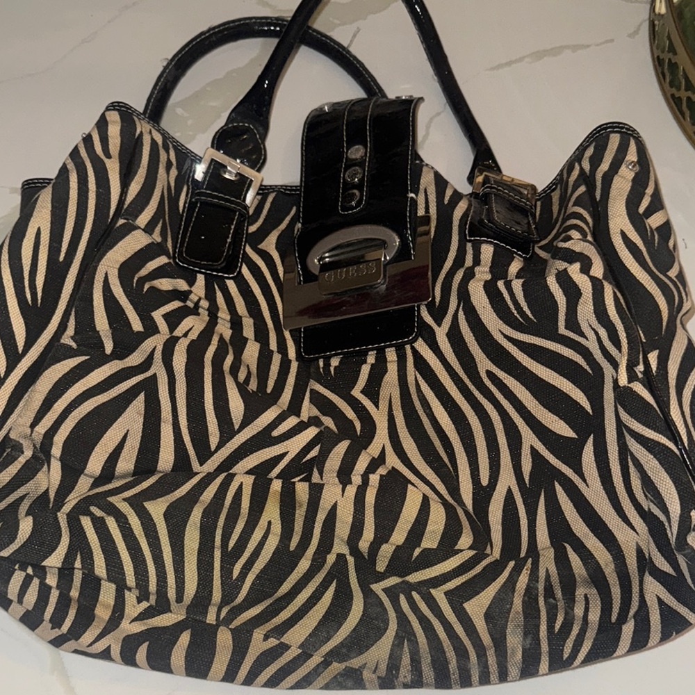 Guess Black and Tan Tote with Zebra Print    $40 or best OFFER!!!